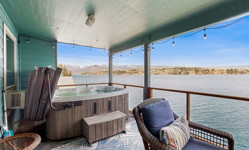 Lakefront home with private hot tub, dock, kayaks, covered veranda & huge views
