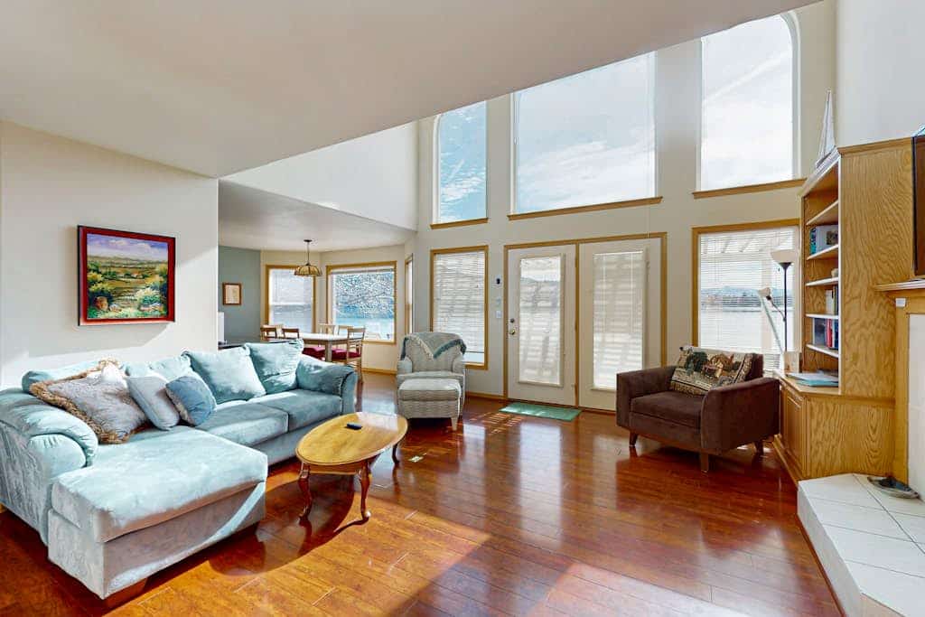 Sunny, lakefront home with huge patio, floating dock & 2 buoys