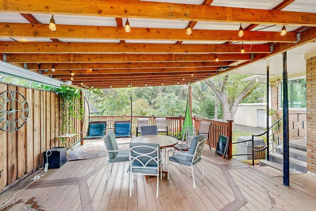 Dog-friendly home on half acre with creek access, game room & 2 fireplaces