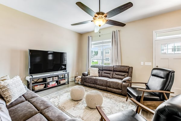Charming, immaculate coastal home with furnished porches, AC, & washer/dryer
