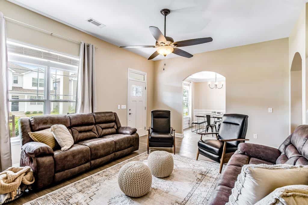 Charming, immaculate coastal home with furnished porches, AC, & washer/dryer