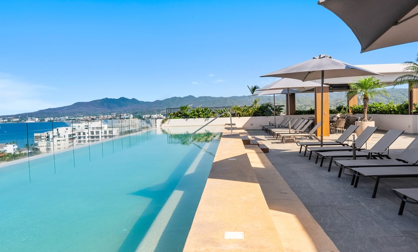 Cozy 1BR Bucerías stay with pool, gym, WiFi & kitchenette.