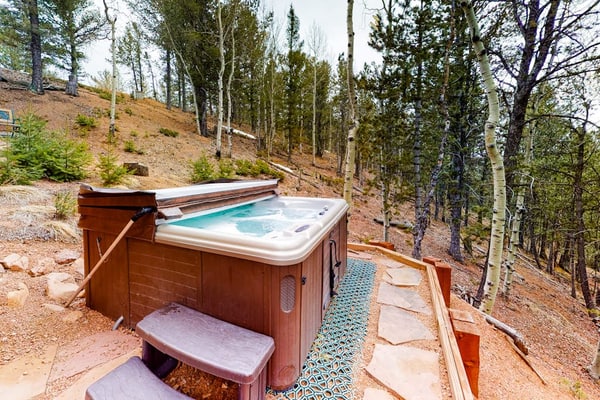 Escape to Bear Crossing, a charming 3-bedroom cabin in Divide, Colorado, perfectly situated for mountain adventures. This pet-friendly retreat features stunning valley views, a private hot tub, and a cozy wood-burning fireplace. Enjoy fully equipped kitchen meals, arcade games, and outdoor firepit nights. Located near Pikes Peak, Mueller State Park, and Cripple Creek casinos, it offers the ultimate year-round getaway for families and outdoor enthusiasts seeking comfort and natural beauty in the heart of the Rockies.