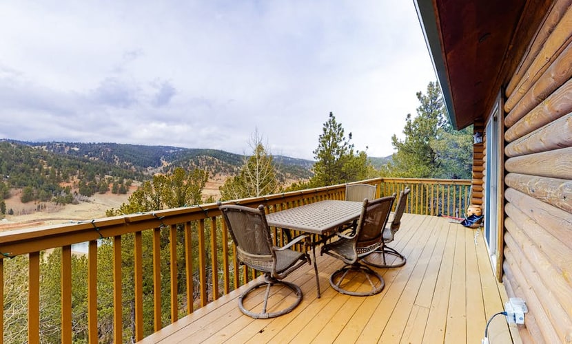 Escape to Bear Crossing, a charming 3-bedroom cabin in Divide, Colorado, perfectly situated for mountain adventures. This pet-friendly retreat features stunning valley views, a private hot tub, and a cozy wood-burning fireplace. Enjoy fully equipped kitchen meals, arcade games, and outdoor firepit nights. Located near Pikes Peak, Mueller State Park, and Cripple Creek casinos, it offers the ultimate year-round getaway for families and outdoor enthusiasts seeking comfort and natural beauty in the heart of the Rockies.