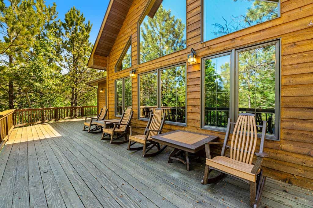 Come hang out at Lazy Bear Lodge, our cozy three bedroom spot tucked away in the quiet Black Hills forest near Deadwood. This rustic home gives you the perfect mix of privacy and convenience, complete with a wrap around deck and a relaxing hot tub for stargazing. You will be close to all the action like skiing at Terry Peak, Sturgis, and Mount Rushmore. With a kitchen ready for big meals and a comfy mountain vibe, it is the best place to call home for your next South Dakota trip.