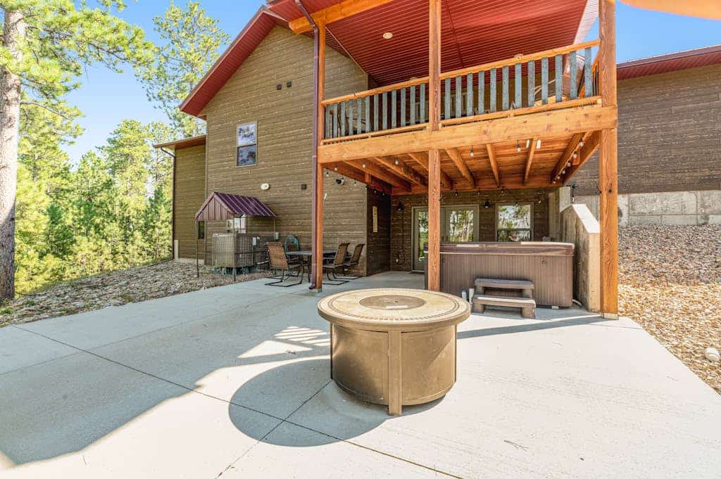 Come enjoy the ultimate Black Hills getaway at Klassy Lodge, our beautiful five bedroom home in Sturgis. This stylish retreat features a private hot tub, a fun game room, and breathtaking views of Pillar Peak. Perfectly situated near National Forest trails, Deadwood casinos, and Mount Rushmore, our lodge is the ideal base for families and groups. Enjoy modern amenities like a gourmet kitchen, cozy fireplaces, and an outdoor fire pit for unforgettable evenings under the stars in the heart of South Dakota.
