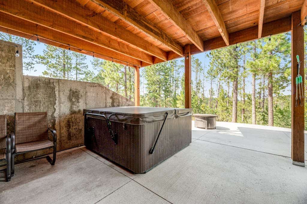 Come enjoy the ultimate Black Hills getaway at Klassy Lodge, our beautiful five bedroom home in Sturgis. This stylish retreat features a private hot tub, a fun game room, and breathtaking views of Pillar Peak. Perfectly situated near National Forest trails, Deadwood casinos, and Mount Rushmore, our lodge is the ideal base for families and groups. Enjoy modern amenities like a gourmet kitchen, cozy fireplaces, and an outdoor fire pit for unforgettable evenings under the stars in the heart of South Dakota.