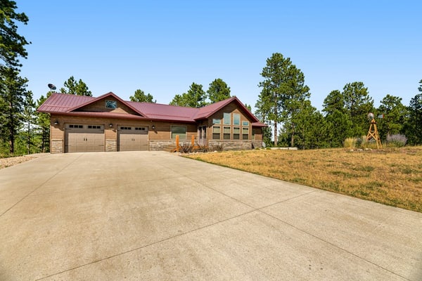 Come enjoy the ultimate Black Hills getaway at Klassy Lodge, our beautiful five bedroom home in Sturgis. This stylish retreat features a private hot tub, a fun game room, and breathtaking views of Pillar Peak. Perfectly situated near National Forest trails, Deadwood casinos, and Mount Rushmore, our lodge is the ideal base for families and groups. Enjoy modern amenities like a gourmet kitchen, cozy fireplaces, and an outdoor fire pit for unforgettable evenings under the stars in the heart of South Dakota.