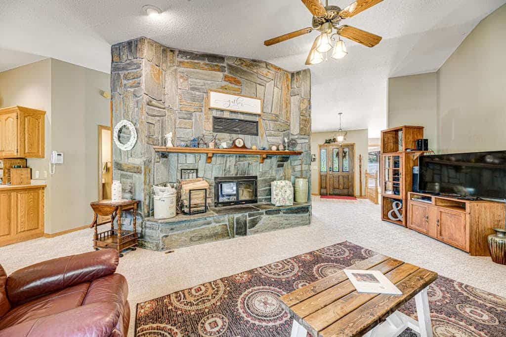 Come experience Crooked Canyon Lodge, a lovely four bedroom retreat tucked away on twenty private acres near Rapid City. This home is perfect for families and pets, featuring wonderful amenities like a hot tub, sauna, and sand volleyball court. You will love the convenience of two full kitchens and spacious living areas, all while staying just minutes from landmarks like Mount Rushmore and Sturgis. It is the perfect spot to enjoy peaceful mountain surroundings while staying close to all the fun in South Dakota.