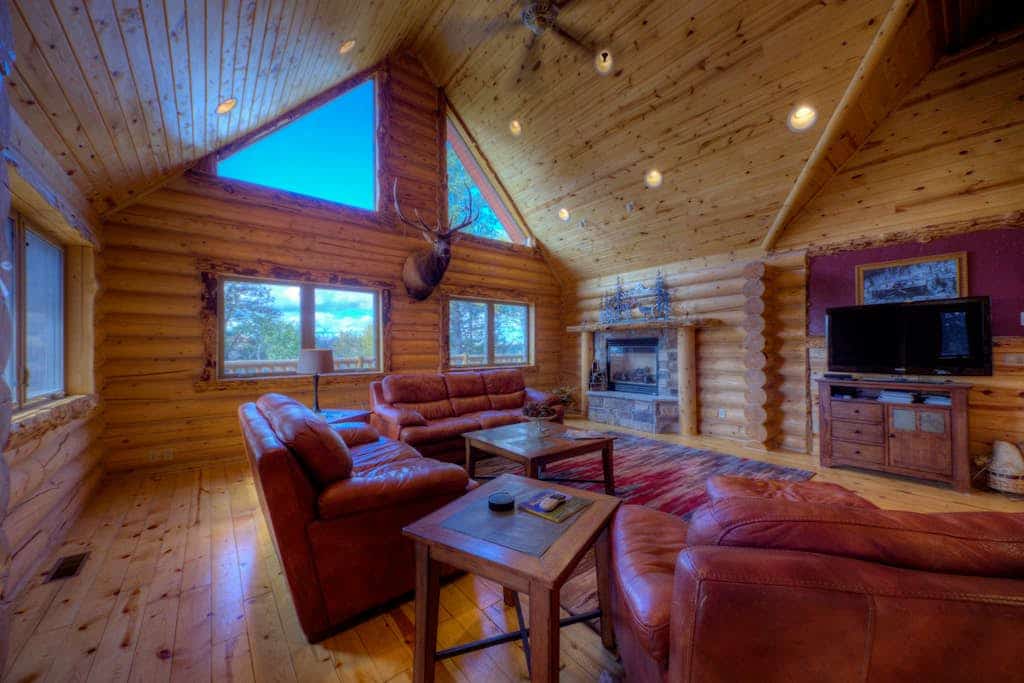 Experience the ultimate mountain getaway at Black Diamond Lodge, a stunning 5-bedroom log cabin near Terry Peak Ski Area. This spacious retreat is perfect for groups, featuring a private hot tub and an action-packed game room. Nestled adjacent to Black Hills National Forest, you have direct access to premier hiking and ATV trails. Whether you are seeking winter skiing or summer adventures in nearby Deadwood, this pet-friendly sanctuary offers the perfect blend of luxury and rustic charm.