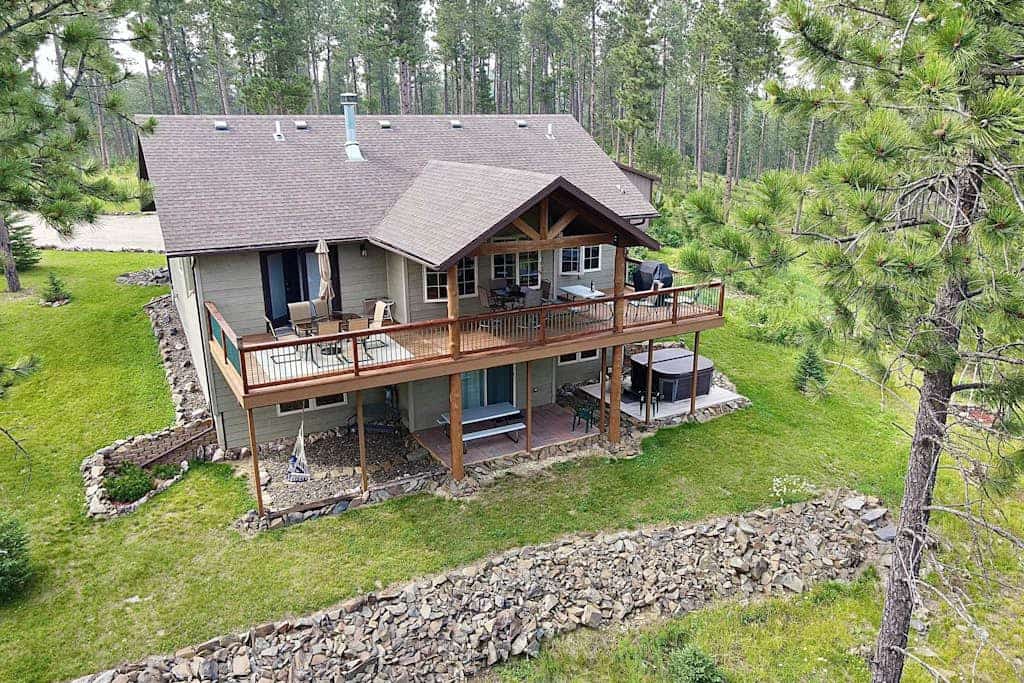 Check out Cliffview Cabin in Nemo for your next Black Hills trip. This big three bedroom spot is perfect if you love ATVs since you can hit the trails right from the house and then soak in the private hot tub. You can hang out with the family playing foosball, enjoy the views from the deck, or head over to the quiet pond nearby. We are located right between Rapid City and Sturgis, so it is the best place to get a mix of adventure and mountain relaxation for your group or family getaway.