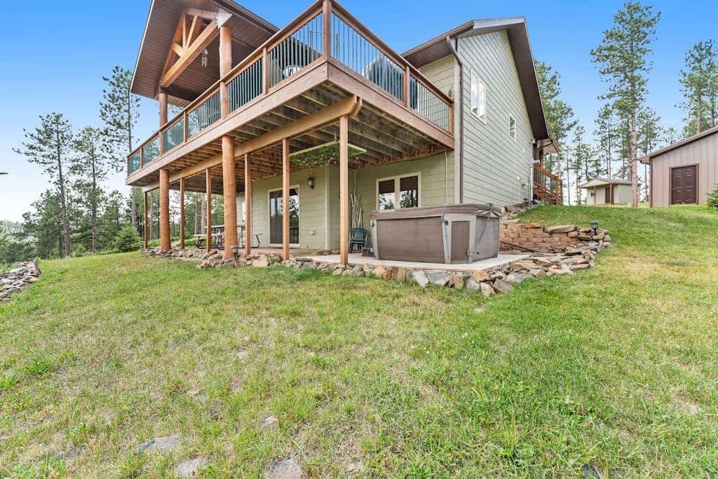 Check out Cliffview Cabin in Nemo for your next Black Hills trip. This big three bedroom spot is perfect if you love ATVs since you can hit the trails right from the house and then soak in the private hot tub. You can hang out with the family playing foosball, enjoy the views from the deck, or head over to the quiet pond nearby. We are located right between Rapid City and Sturgis, so it is the best place to get a mix of adventure and mountain relaxation for your group or family getaway.