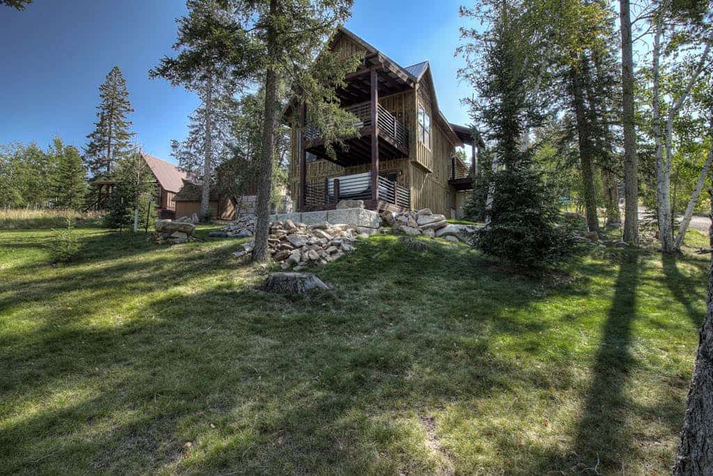 Escape to Lost Buffalo Lodge, a stunning 3-bedroom retreat located close to the Terry Peak Ski Area. This cozy woodland home features a private hot tub, a gas firepit, and an expansive covered patio perfect for year-round relaxation. With lofty ceilings, two spacious living areas, and easy access to the Black Hills, Lead, and Deadwood, it is the ultimate basecamp for your family adventures. Enjoy the comfort of a fully equipped kitchen and a rare, flat yard in this prime mountain destination.