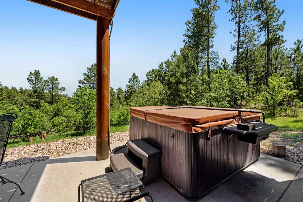 Escape to Ridgeview Retreat, a stunning 4-bedroom Black Hills cabin offering the perfect blend of luxury and nature. Located just three miles from Deadwood, this spacious 3-story home features a private hot tub, a cozy wood-burning fireplace, and sweeping forested views. Whether you are exploring nearby Mount Rushmore or relaxing on the deck, this family-friendly basecamp provides central air, a gourmet kitchen, and easy access to local attractions. Experience ultimate comfort in the heart of the mountains.