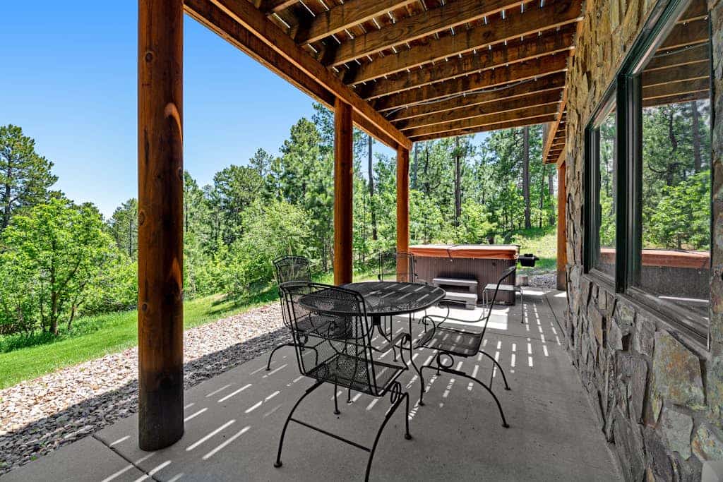 Escape to Ridgeview Retreat, a stunning 4-bedroom Black Hills cabin offering the perfect blend of luxury and nature. Located just three miles from Deadwood, this spacious 3-story home features a private hot tub, a cozy wood-burning fireplace, and sweeping forested views. Whether you are exploring nearby Mount Rushmore or relaxing on the deck, this family-friendly basecamp provides central air, a gourmet kitchen, and easy access to local attractions. Experience ultimate comfort in the heart of the mountains.
