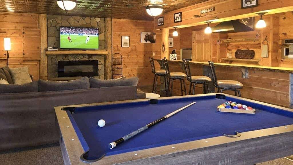 Come experience the best Black Hills getaway at Eagle Pine Lodge, our dog friendly spot just minutes from Custer. This roomy three bedroom house has a private jacuzzi room, a movie room, and a big deck that is perfect for taking in those mountain views. You will also have full access to a nearby pool and playground, so it is great for families. Since we are close to Custer State Park, Mount Rushmore, and Crazy Horse, our lodge is the perfect mix of comfort and adventure for your next trip.