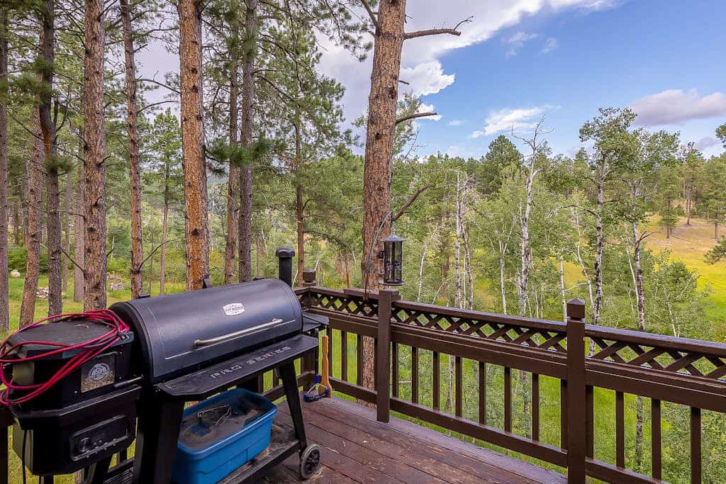 Escape to Big Steve Timbers, a sunlit three bedroom retreat near Rapid City perfectly situated for your Black Hills adventure. This cozy mountain home features a warm fireplace, a well equipped kitchen, and a spacious balcony with stunning views. Enjoy family fun with board games and ping pong, or explore nearby hiking trails, Pactola Lake, and Mount Rushmore. Whether you are seeking a peaceful forest getaway or an action packed basecamp for exploring South Dakota, our home offers the ideal mountain escape.