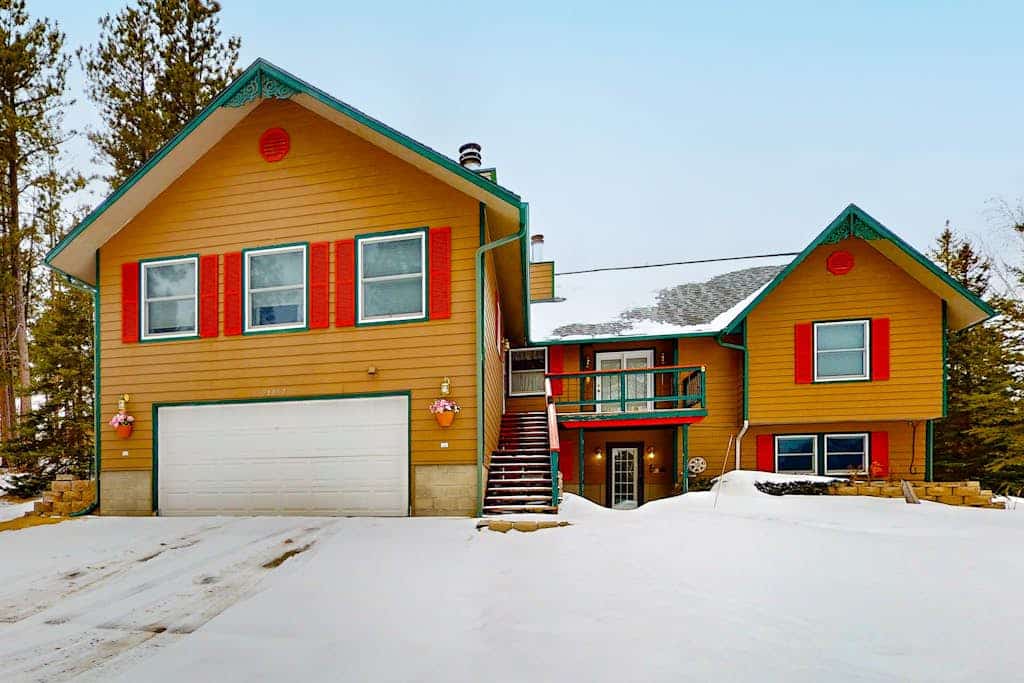 Experience the ultimate Black Hills getaway at Aspen Lodge, a spacious 5-bedroom retreat near Deer Mountain. Perfect for families, this home features two full kitchens, a private hot tub, and stunning mountain views. Relax by the fireplace or explore nearby attractions like Terry Peak skiing, historic Deadwood, and the charming town of Lead. With a massive yard and cozy amenities, it is the ideal year-round basecamp for your next mountain adventure.