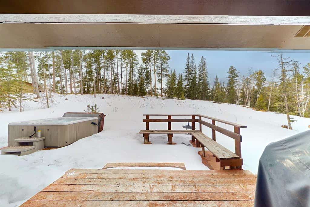 Experience the ultimate Black Hills getaway at Aspen Lodge, a spacious 5-bedroom retreat near Deer Mountain. Perfect for families, this home features two full kitchens, a private hot tub, and stunning mountain views. Relax by the fireplace or explore nearby attractions like Terry Peak skiing, historic Deadwood, and the charming town of Lead. With a massive yard and cozy amenities, it is the ideal year-round basecamp for your next mountain adventure.