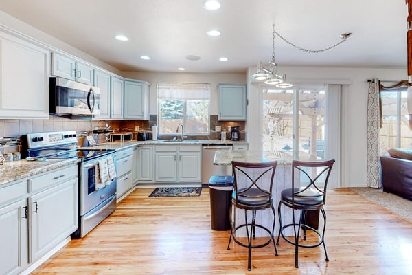 Experience the ultimate Colorado getaway at Windy Hill Retreat. This spacious five bedroom home offers a perfect blend of comfort and adventure, featuring a massive fenced backyard that is ideal for your furry friends. Enjoy three levels of living space, a gourmet kitchen, and mountain views just steps away. With easy access to hiking trails and major attractions like Garden of the Gods, our family friendly home is the perfect base for your next group vacation in beautiful Colorado Springs.