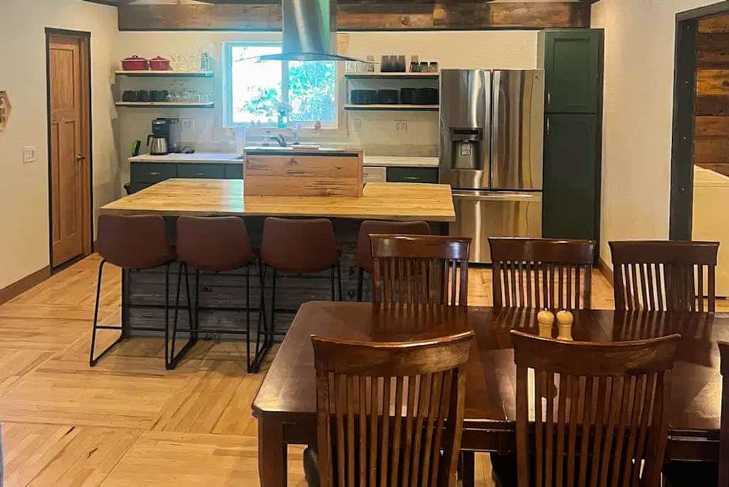 Escape to Honey Bee Hideaway, a serene and accessible mountain retreat in Lead, South Dakota. This single level home features stunning views, a relaxing porch, and a full kitchen. Perfect for families and pets, it is minutes from Terry Peak skiing, Deadwood casinos, and local golf. Enjoy modern comforts and a cozy atmosphere after exploring the Black Hills. Your peaceful getaway awaits in this welcoming home.