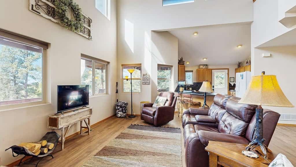 Escape to The Hideaway, a spacious 4-bedroom lodge in Florissant, Colorado, perfect for family getaways and dog-friendly adventures. This contemporary mountain home features an expansive deck with stunning views, a cozy wood stove, and multiple living areas to spread out. Enjoy a fully equipped kitchen and family-friendly amenities like board games and foosball. Located near Florissant Fossil Beds and Cripple Creek, it is the ideal base for exploring the Pikes Peak region while enjoying a secluded and peaceful retreat.