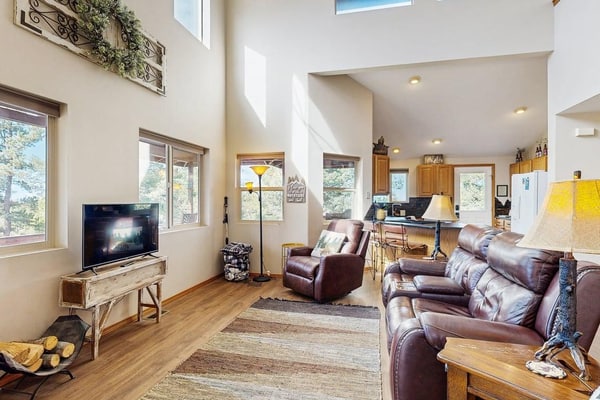 Escape to The Hideaway, a spacious 4-bedroom lodge in Florissant, Colorado, perfect for family getaways and dog-friendly adventures. This contemporary mountain home features an expansive deck with stunning views, a cozy wood stove, and multiple living areas to spread out. Enjoy a fully equipped kitchen and family-friendly amenities like board games and foosball. Located near Florissant Fossil Beds and Cripple Creek, it is the ideal base for exploring the Pikes Peak region while enjoying a secluded and peaceful retreat.