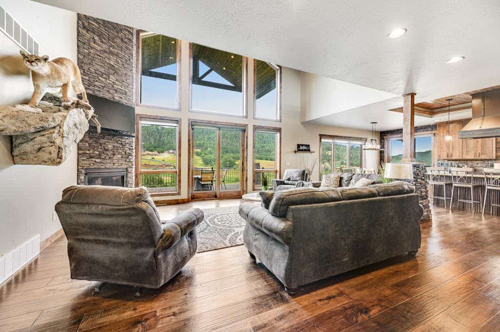 Come enjoy the perfect Black Hills escape at Cedar Lodge on 17. This custom four bedroom home sits right on the Boulder Canyon golf course with amazing views of the pond and island green. You can kick back in your private hot tub, play some pool, or hang out by the custom firepits after a long day of exploring. We are just minutes away from historic Deadwood and Sturgis, making this the best spot to stay while you visit Mount Rushmore, Crazy Horse, and the local trails. Your relaxing mountain getaway is ready for you.