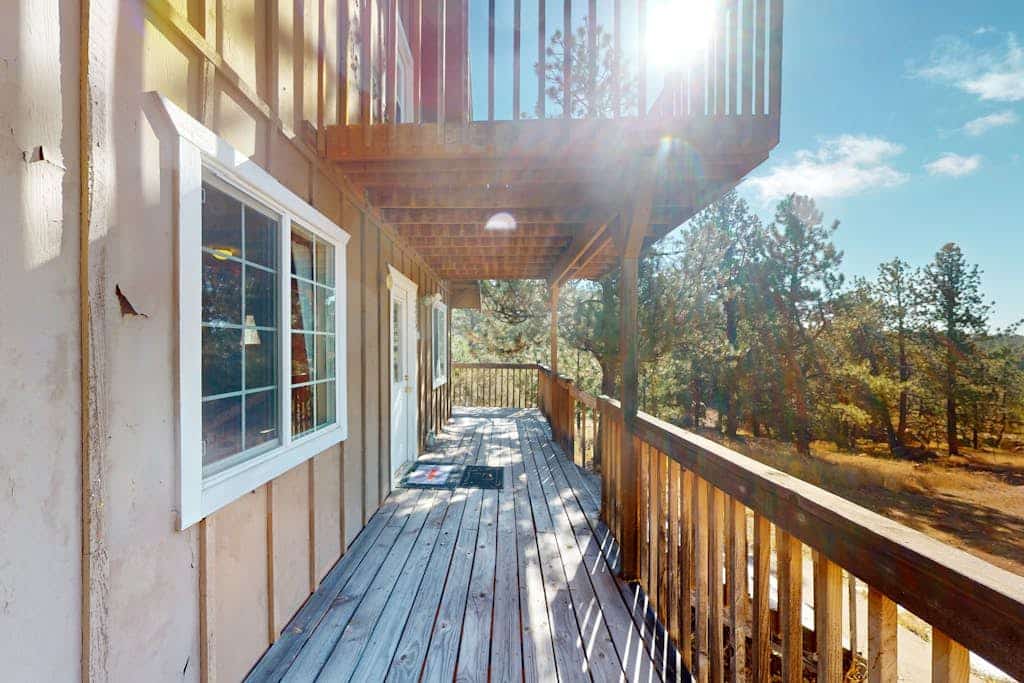 Escape to Pine Perch, a charming A-frame retreat nestled in the heart of Florissant. This cozy two-bedroom home offers the perfect mountain getaway, featuring a warm wood stove, a fully equipped kitchen, and a peaceful balcony for stargazing. Ideally located near Pikes Peak attractions, including the Colorado Wolf and Wildlife Center and scenic mountain trails, this family-friendly sanctuary provides everything you need for a restful nature retreat. Enjoy modern comforts in a serene, tree-lined setting.