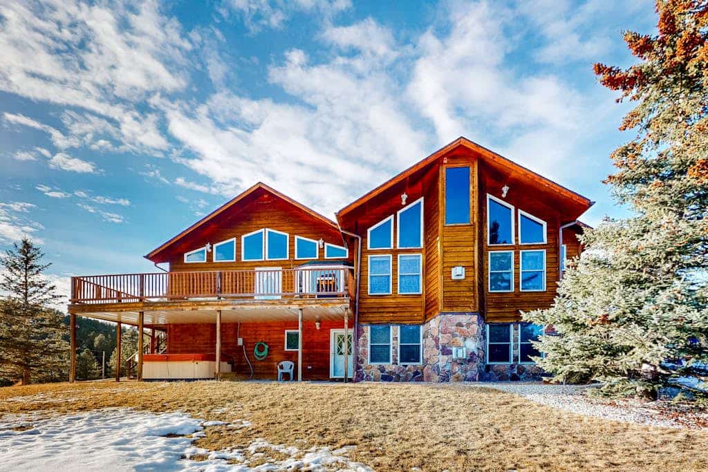 Come hang out at this big 5 bedroom cabin in the Black Hills, ideal for your next family trip or getaway with friends. You will love the awesome forest views, the private hot tub, and the game room with a pool table. Chill by the fireplace in the main room or head out to check out the nearby trails and mountain resort. Just a few minutes from the town of Lead, this quiet spot is the perfect mix of comfort and adventure for a mountain escape any time of year.