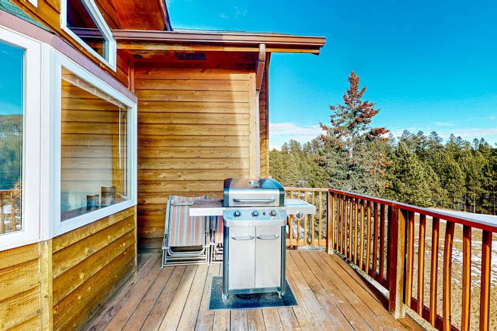 Come hang out at this big 5 bedroom cabin in the Black Hills, ideal for your next family trip or getaway with friends. You will love the awesome forest views, the private hot tub, and the game room with a pool table. Chill by the fireplace in the main room or head out to check out the nearby trails and mountain resort. Just a few minutes from the town of Lead, this quiet spot is the perfect mix of comfort and adventure for a mountain escape any time of year.