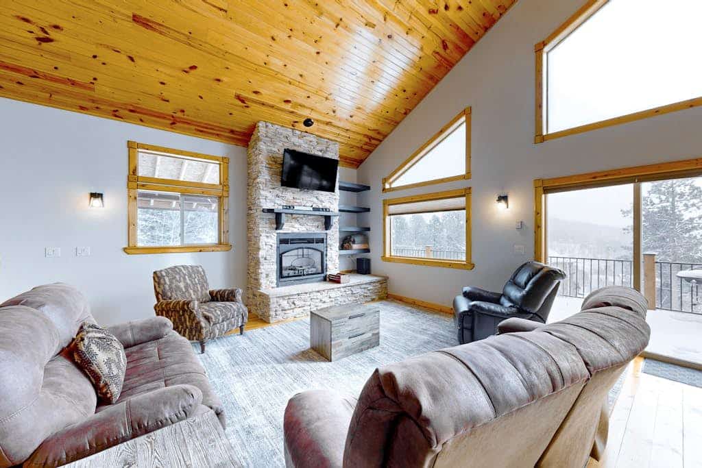 Experience the ultimate Black Hills getaway at Pleasant View Lodge, a spacious 5-bedroom cabin in Lead. Perfect for families, this retreat features a private hot tub, a fun-filled game room, and stunning mountain views. Relax by the gas fireplace or enjoy a meal in the fully equipped kitchen. Ideally located near Terry Peak Ski Area and the historic charm of Deadwood, our home offers the perfect blend of adventure and comfort for every season. Book your mountain escape today for an unforgettable stay.