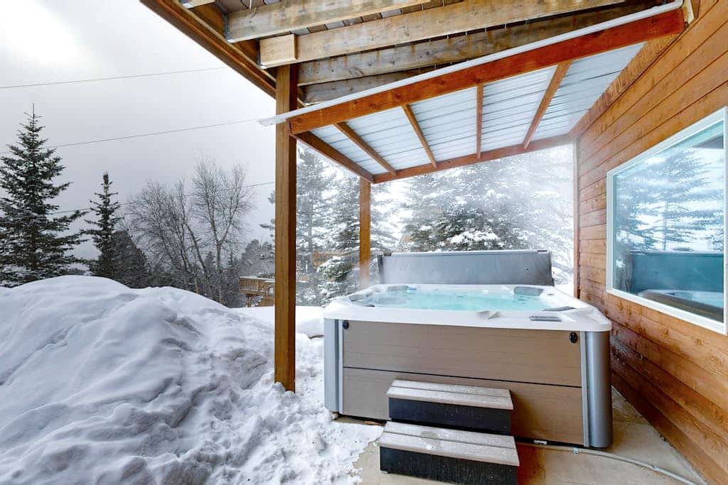 Experience the ultimate Black Hills getaway at Pleasant View Lodge, a spacious 5-bedroom cabin in Lead. Perfect for families, this retreat features a private hot tub, a fun-filled game room, and stunning mountain views. Relax by the gas fireplace or enjoy a meal in the fully equipped kitchen. Ideally located near Terry Peak Ski Area and the historic charm of Deadwood, our home offers the perfect blend of adventure and comfort for every season. Book your mountain escape today for an unforgettable stay.