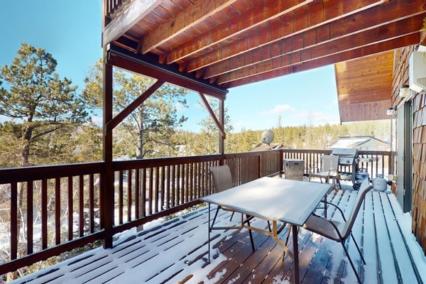 Escape to Buffalo Lodge, a stunning three-story cabin in the Black Hills near Lead, South Dakota. Perfect for families, this spacious retreat features four decks with breathtaking mountain views and a private hot tub for ultimate relaxation. Enjoy a cozy fireplace, a fun-filled game room, and a modern kitchen. Ideally located minutes from Terry Peak Ski Area and close to Deadwood, this cabin offers year-round adventure, from winter skiing to summer hiking and fishing. Your perfect mountain getaway starts here.