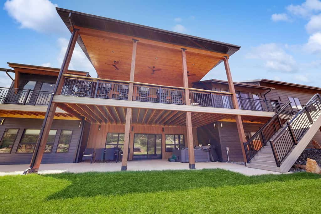 Experience an exceptional getaway at Eagles Nest on 17 in the Black Hills. This spacious six bedroom residence in Sturgis offers panoramic views of the lake, mountains, and golf course. Ideal for groups, the property features a private hot tub, a game room, and a fireplace. Located minutes from Sturgis, Deadwood, and Mount Rushmore, this pet friendly destination provides the perfect setting for a memorable family retreat in the heart of South Dakota.