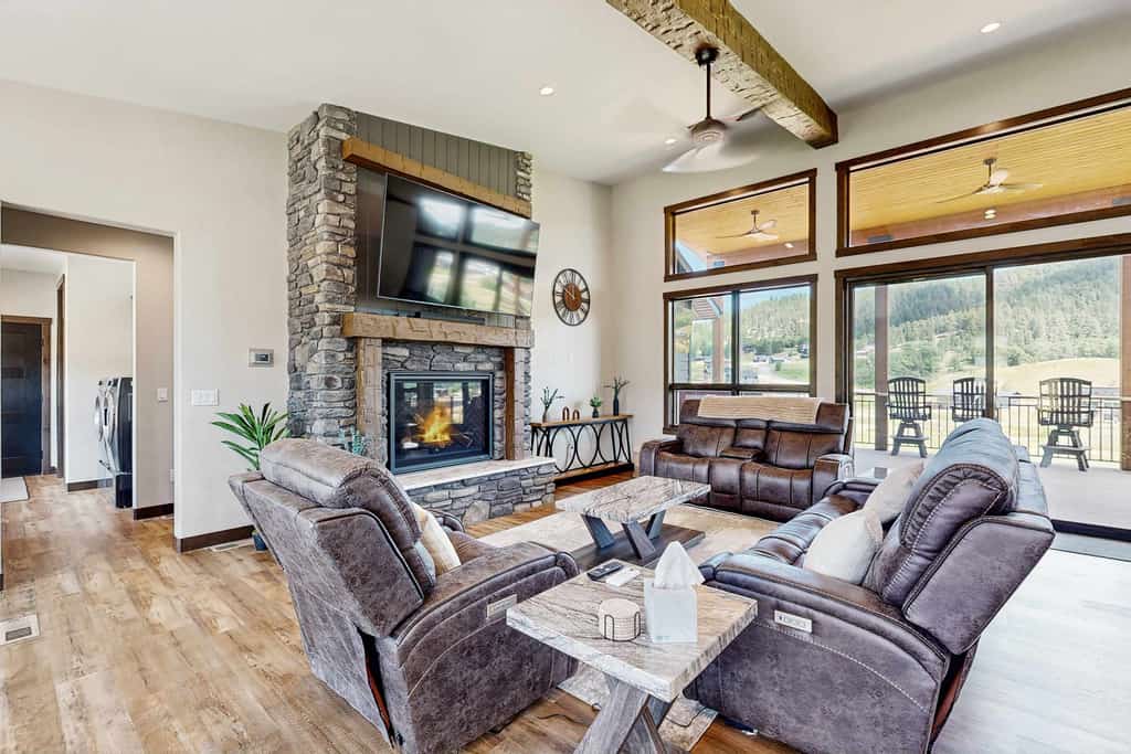 Experience an exceptional getaway at Eagles Nest on 17 in the Black Hills. This spacious six bedroom residence in Sturgis offers panoramic views of the lake, mountains, and golf course. Ideal for groups, the property features a private hot tub, a game room, and a fireplace. Located minutes from Sturgis, Deadwood, and Mount Rushmore, this pet friendly destination provides the perfect setting for a memorable family retreat in the heart of South Dakota.