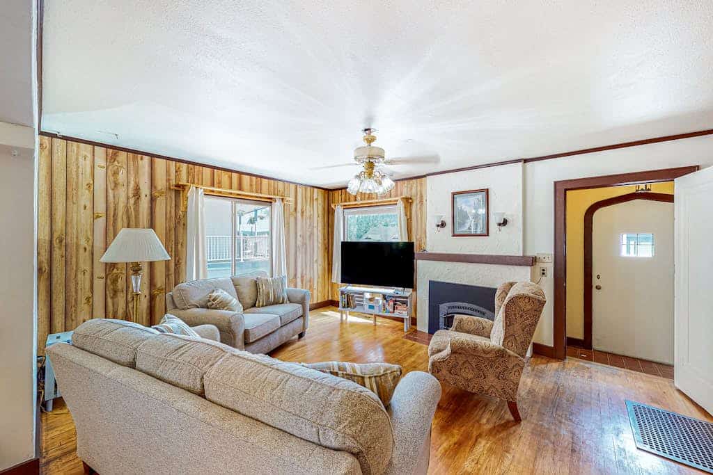 Experience the ultimate mountain getaway at Miners Cottage in Lead. This charming, wood-lined retreat offers a cozy gas fireplace and updated amenities, perfectly positioned near world-class skiing at Terry Peak. Enjoy a short drive to historic Deadwood for Wild West adventures and gaming, then return to your peaceful home base. With a fully equipped kitchen, comfortable bedrooms, and modern comforts, this cottage is the ideal choice for families and outdoor enthusiasts seeking a memorable Black Hills escape.