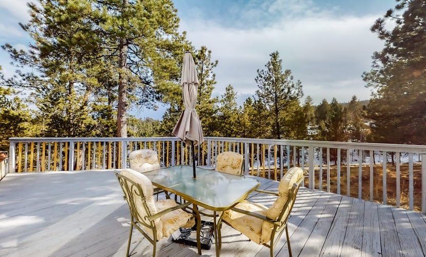 Experience rustic charm at this three-story mountain retreat in Woodland Park. Perfect for families and pets, this home features a fully equipped kitchen, cozy living areas, and two spacious decks for outdoor dining with scenic views. Enjoy a peaceful escape just minutes from local shops, coffee houses, and the Golden Meadows Dog Park. With easy access to Pikes Peak and Colorado Springs, this getaway offers the ideal base for hiking, fishing, and exploring the beauty of the Colorado mountains.