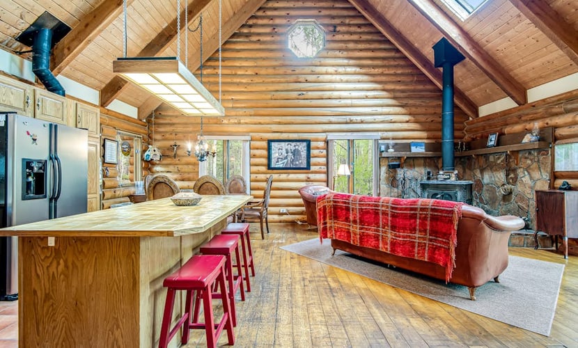 Escape to Pikes Peak Retreat, a stunning 3-bedroom log cabin nestled in a serene aspen grove near Divide, Colorado. Perfectly situated for outdoor enthusiasts, this light-filled getaway offers direct access to National Forest trails, mountain climbing, and fishing. Enjoy cozy evenings by the wood-burning fireplace, relax on the furnished decks, or stargaze by the firepit. With modern amenities, a spacious loft, and proximity to Mueller State Park, it is the ultimate mountain basecamp for your family adventure.