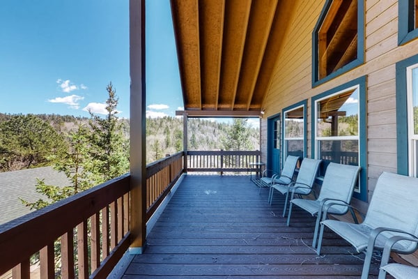 Escape to Timberline Vista, a spacious 4-bedroom mountain retreat in Cripple Creek. This rustic cabin offers the perfect blend of comfort and adventure, featuring a full kitchen, cozy fireplace, and a private hot tub for stargazing. Ideally located for outdoor enthusiasts, you are minutes away from hiking, fishing, and local casinos. Whether you are planning a family getaway or a peaceful mountain basecamp, this home provides breathtaking views and a tranquil atmosphere for your next Colorado adventure.