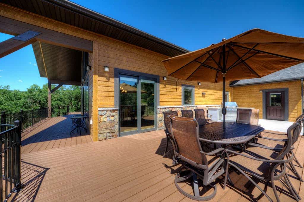 Escape to this spacious 4 bedroom mountain retreat in Sturgis, perfectly positioned between Deadwood and the Black Hills National Forest. Overlooking the Boulder Canyon Golf Course, this home features a private hot tub, a large deck with a built in grill, and stunning views of Pillar Peak. With room for the whole group, a gourmet kitchen, and a cozy fireplace, it is the ultimate basecamp for golfing, hiking, or exploring the scenic trails of South Dakota. Experience luxury and nature in one incredible setting.