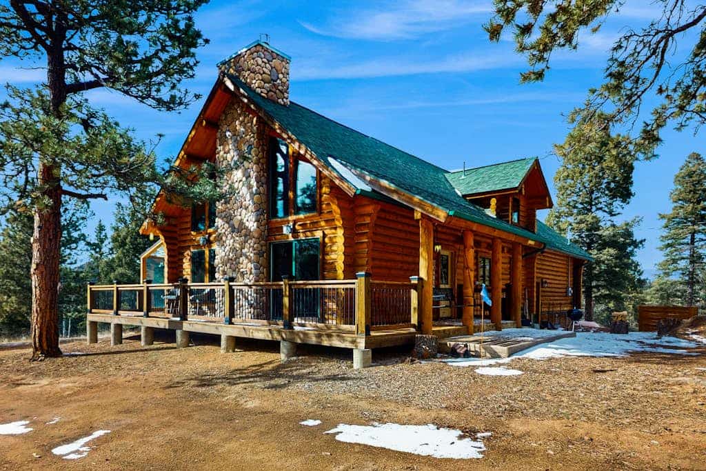 Escape to Serenity View Cabin, a beautiful 3-bedroom mountain retreat in Cripple Creek. This family-friendly home features a wrap-around deck with stunning views, a cozy fire pit, and a fun foosball table. Perfectly situated for outdoor adventure, you are steps from hiking trails and a short drive from downtown casinos and dining. Whether you are relaxing on your private balcony or exploring the Rockies, this charming house offers the ultimate blend of comfort and mountain exploration for your next getaway.