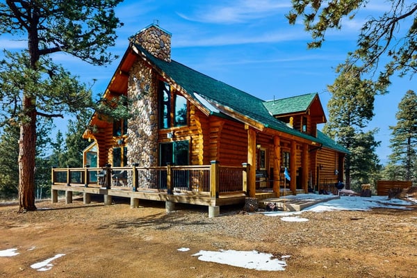 Escape to Serenity View Cabin, a beautiful 3-bedroom mountain retreat in Cripple Creek. This family-friendly home features a wrap-around deck with stunning views, a cozy fire pit, and a fun foosball table. Perfectly situated for outdoor adventure, you are steps from hiking trails and a short drive from downtown casinos and dining. Whether you are relaxing on your private balcony or exploring the Rockies, this charming house offers the ultimate blend of comfort and mountain exploration for your next getaway.