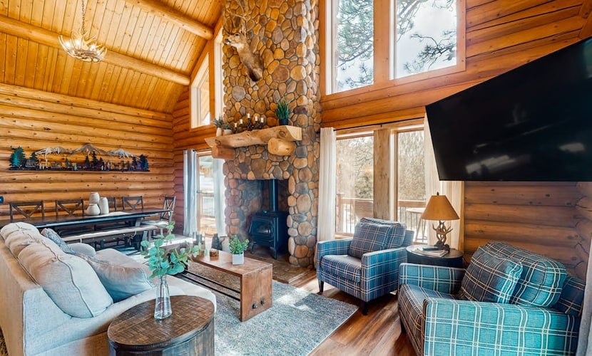 Escape to Serenity View Cabin, a beautiful 3-bedroom mountain retreat in Cripple Creek. This family-friendly home features a wrap-around deck with stunning views, a cozy fire pit, and a fun foosball table. Perfectly situated for outdoor adventure, you are steps from hiking trails and a short drive from downtown casinos and dining. Whether you are relaxing on your private balcony or exploring the Rockies, this charming house offers the ultimate blend of comfort and mountain exploration for your next getaway.
