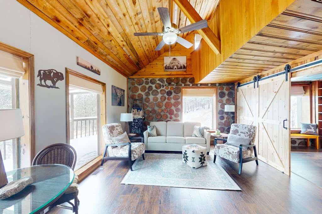 Experience a unique escape at this custom built 2 bedroom cabin near Custer. Crafted with a one of a kind stacked cordwood design, this retreat blends rustic charm with modern comfort. Enjoy high vaulted ceilings, a cozy wood stove, and a spacious deck perfect for watching Black Hills sunsets. Located minutes from Mount Rushmore, Custer State Park, and Crazy Horse, our haven is the ideal base for couples and families looking to explore South Dakota while enjoying a serene and character filled getaway.