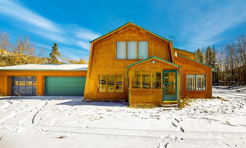 Escape to Rainbows End, a charming mountain retreat in Cripple Creek, Colorado. This dog-friendly home features stunning mountain views, a cozy wood-burning fireplace, and a private basketball court. Perfectly positioned for outdoor adventure, you are minutes away from scenic hiking trails, local casinos, and the famous Ice Festival. Whether you are relaxing in the sun-drenched living area or watching wildlife from the patio, this peaceful getaway is the ideal base for families and nature lovers seeking a memorable escape.