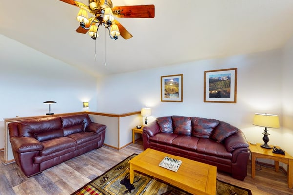 Escape to Horseshoe Haven, a stunning three bedroom mountain retreat in Divide, Colorado. This airy home features vaulted ceilings, a cozy fireplace, and a full kitchen. Relax on the spacious deck with breathtaking mountain views and a grill. Located near Pikes Peak and Mueller State Park, this peaceful home offers easy access to hiking and biking. Whether you seek adventure or a serene getaway, this family friendly retreat is the perfect base for your Colorado Rockies vacation.
