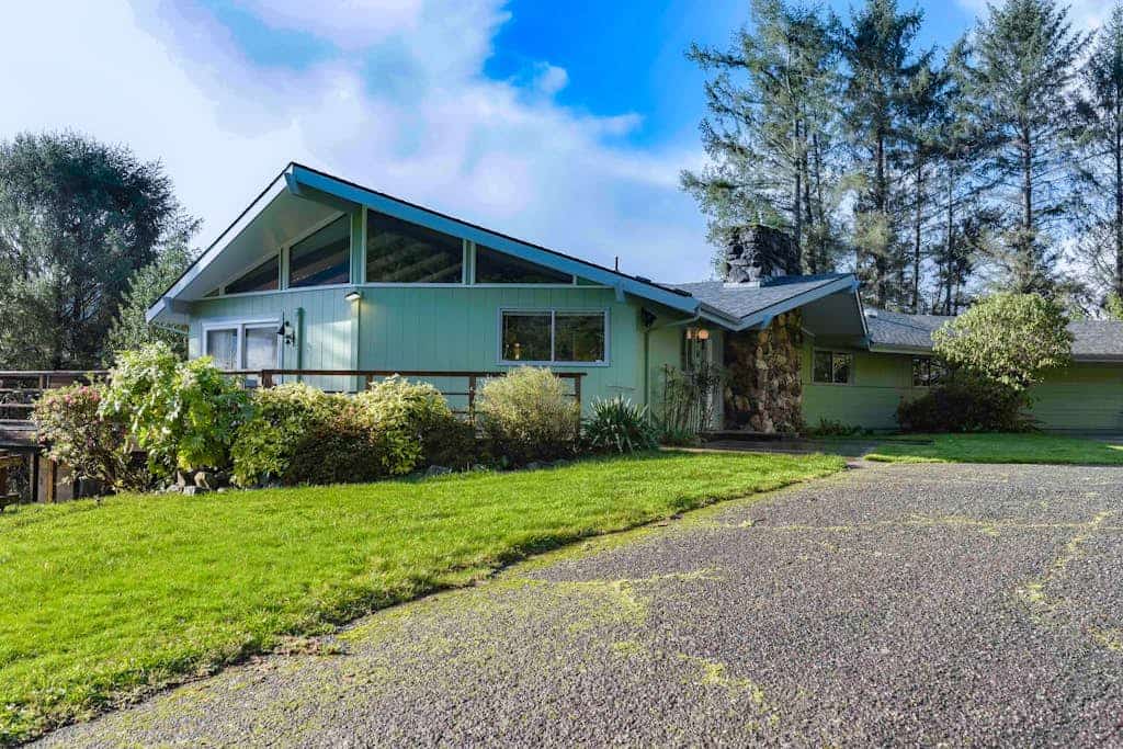 Set on a hilltop surrounded by Redwood National Park w/ views of the Pacific