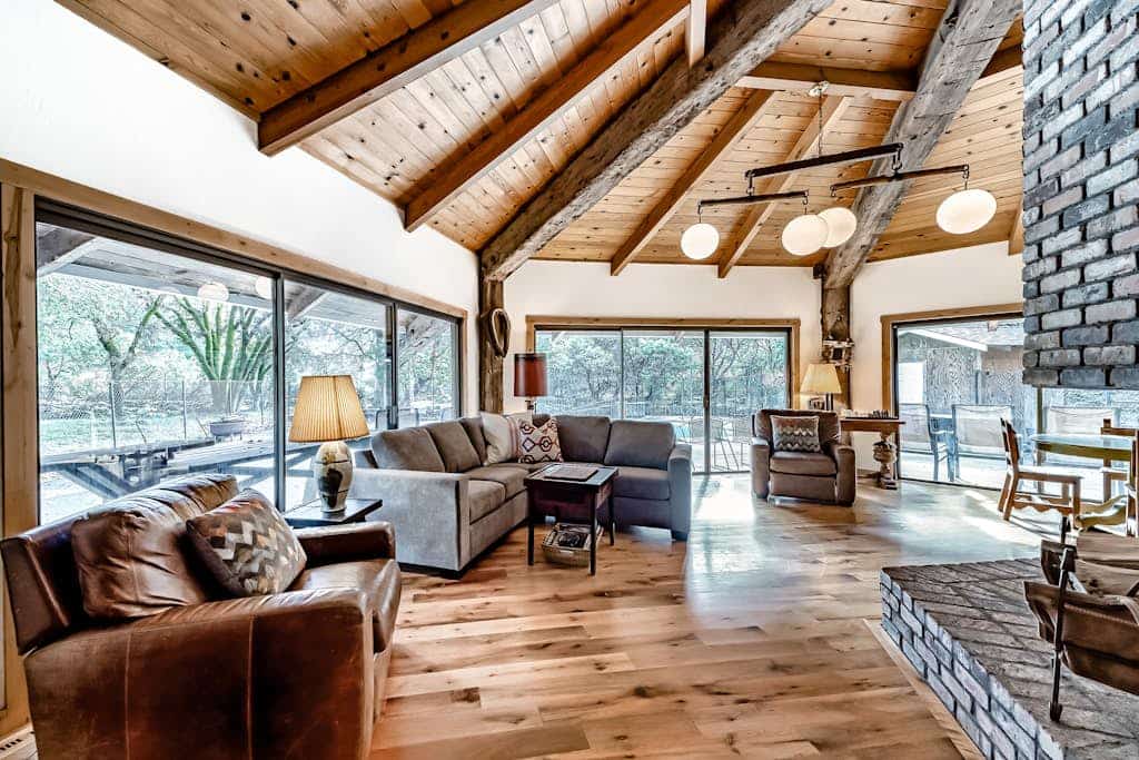Riverside cabin with private pool, cozy fireplace, patio & dog-friendly retreat