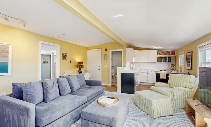 Welcome to White Dory Beach Retreat, a charming one-bedroom, one-and-a-half-bath condominium nestled in Provincetown's sought-after East End. Set within the historic White Dory, this beautifully appointed retreat offers the perfect blend of coastal charm, modern comfort, and an unbeatable location. Spend your days exploring Provincetown's vibrant shops, galleries, and restaurants before returning to your peaceful waterfront escape.
Wake each morning to beautiful bay views from your private deck, where you can sip your coffee as the sun rises over the harbor or unwind with a glass of wine after a day at the beach. Just steps across Commercial Street, the White Dory's private beach invites you to swim, kayak, paddleboard, stroll along the shoreline, or simply soak in Provincetown's spectacular sunsets. Long cherished for its private beach access and tranquil East End setting, the White Dory offers a quintessential Cape Cod experience just moments from the heart of town.
Designed for two guests, the thoughtfully furnished condo features a spacious bedroom with a queen-size bed, one full bath and an additional half bath, a fully equipped kitchen, comfortable living and dining areas, high-speed Wi-Fi, air conditioning, dedicated off-street parking, and beautifully maintained grounds. You'll also enjoy the convenience of being within walking distance of Provincetown's renowned art galleries, cafés, boutique shopping, whale watching excursions, the Pilgrim Monument, and the lively energy of Commercial Street while still enjoying the serenity of the East End.
Whether you're planning a romantic getaway, a relaxing week by the water, or a quintessential Cape Cod escape, White Dory Beach Retreat offers everything you need for an unforgettable stay—private beach access, bay views, modern comforts, and one of Provincetown's most coveted locations.